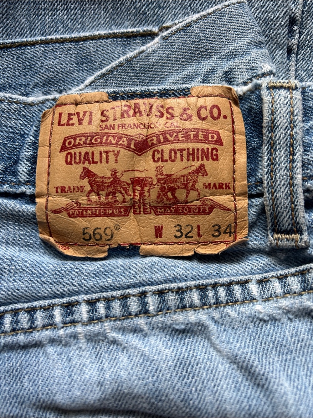 Levi's 569 Relaxed Fit Jeans in Light Blue Denim with Tan Patch 32x34